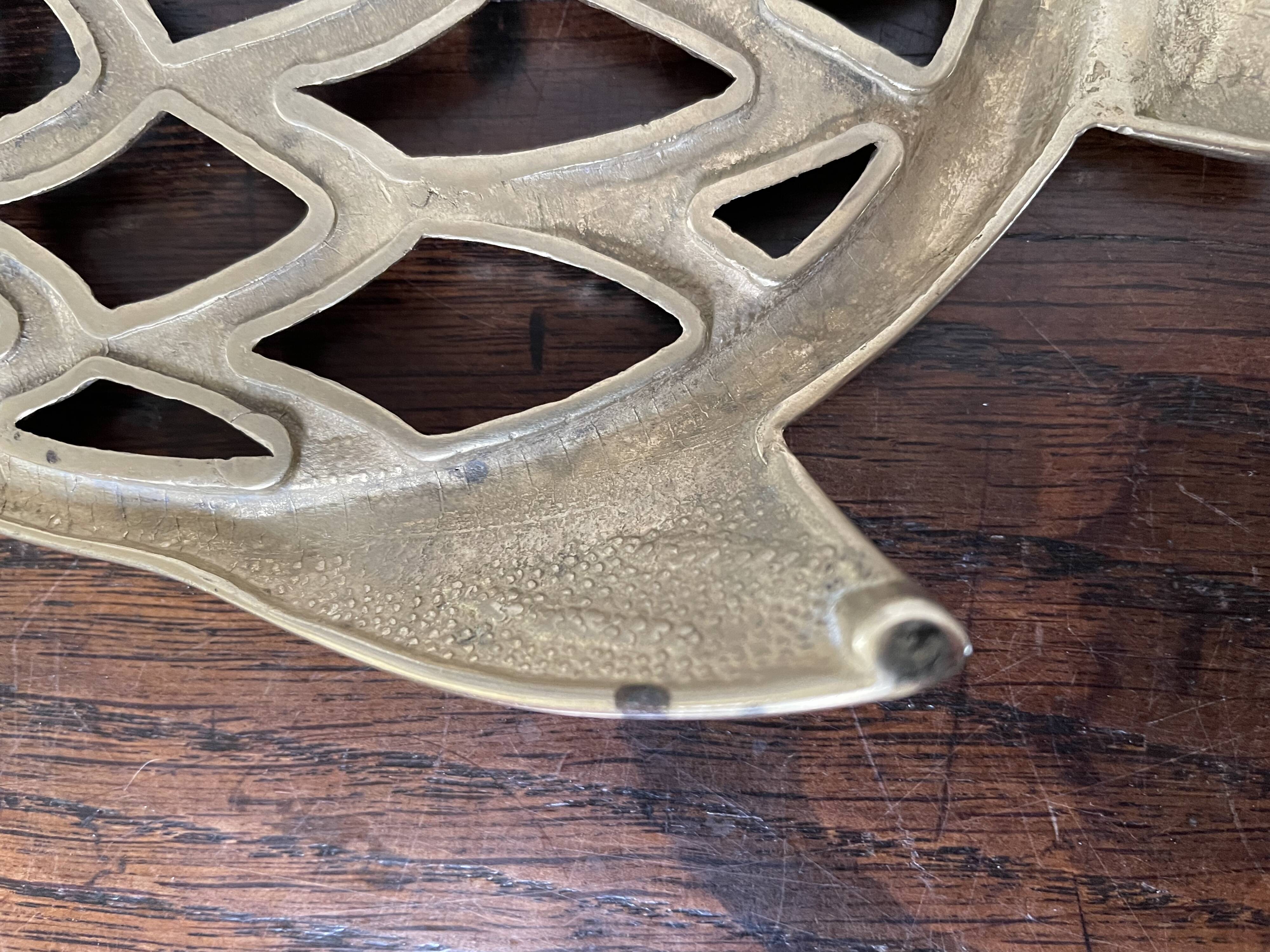 Owl trivet in golden brass