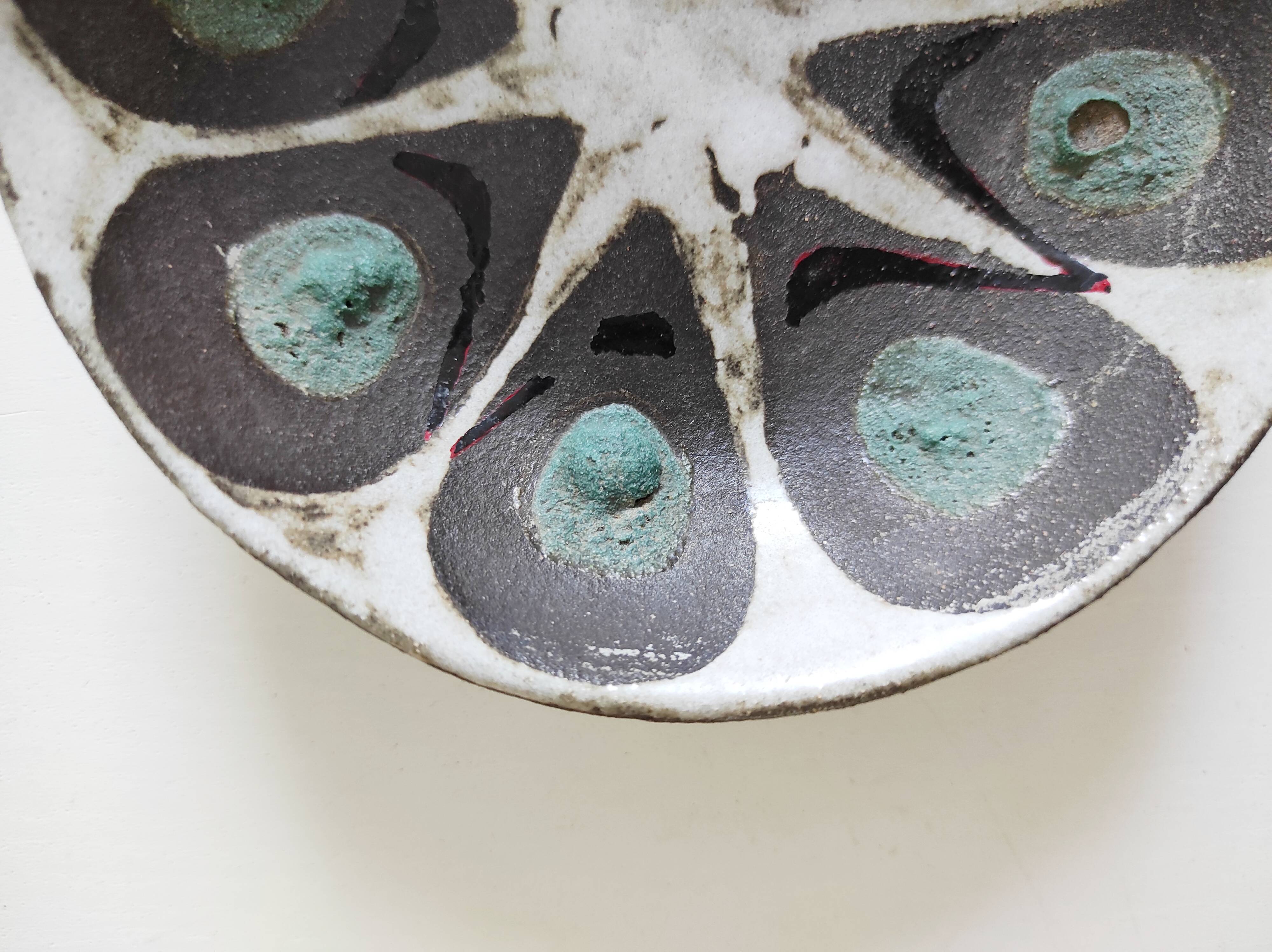 Empty ceramic pocket cup signed Suz