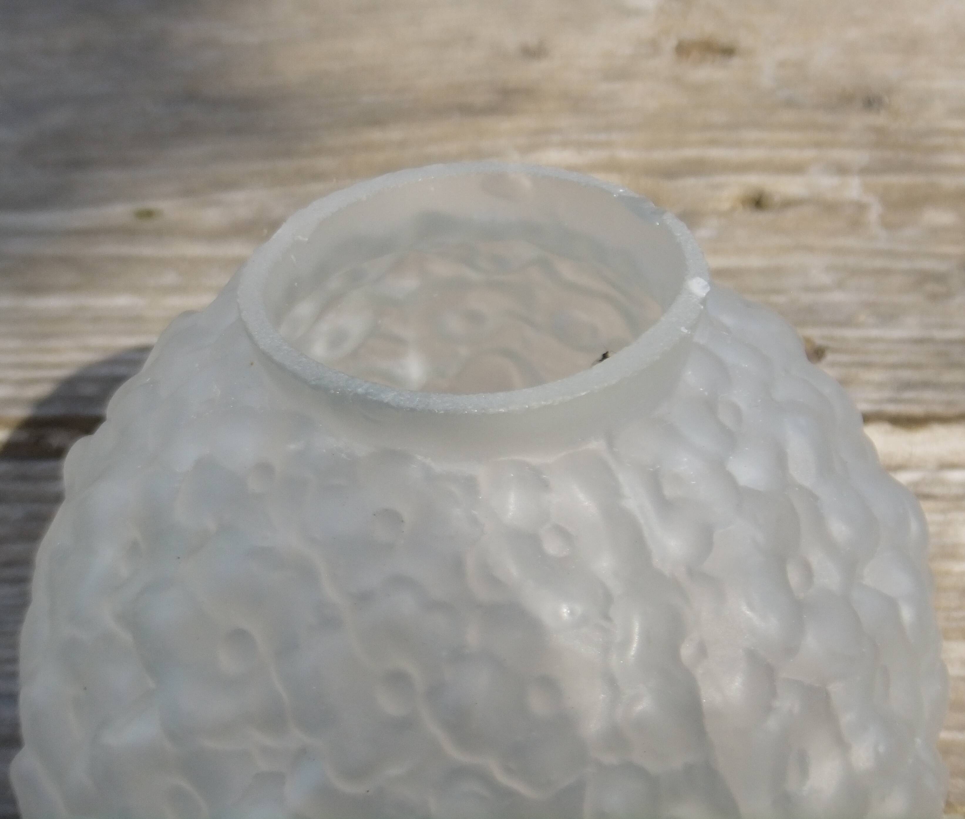 Art Deco ball vase pair with flower and leaf decor