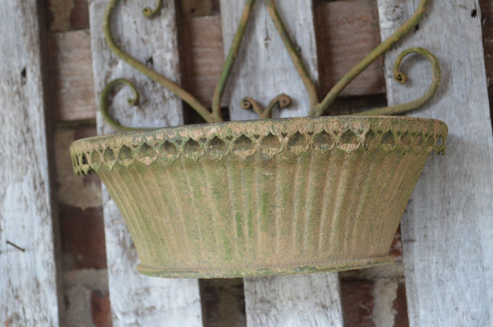 Patinated iron wall planter