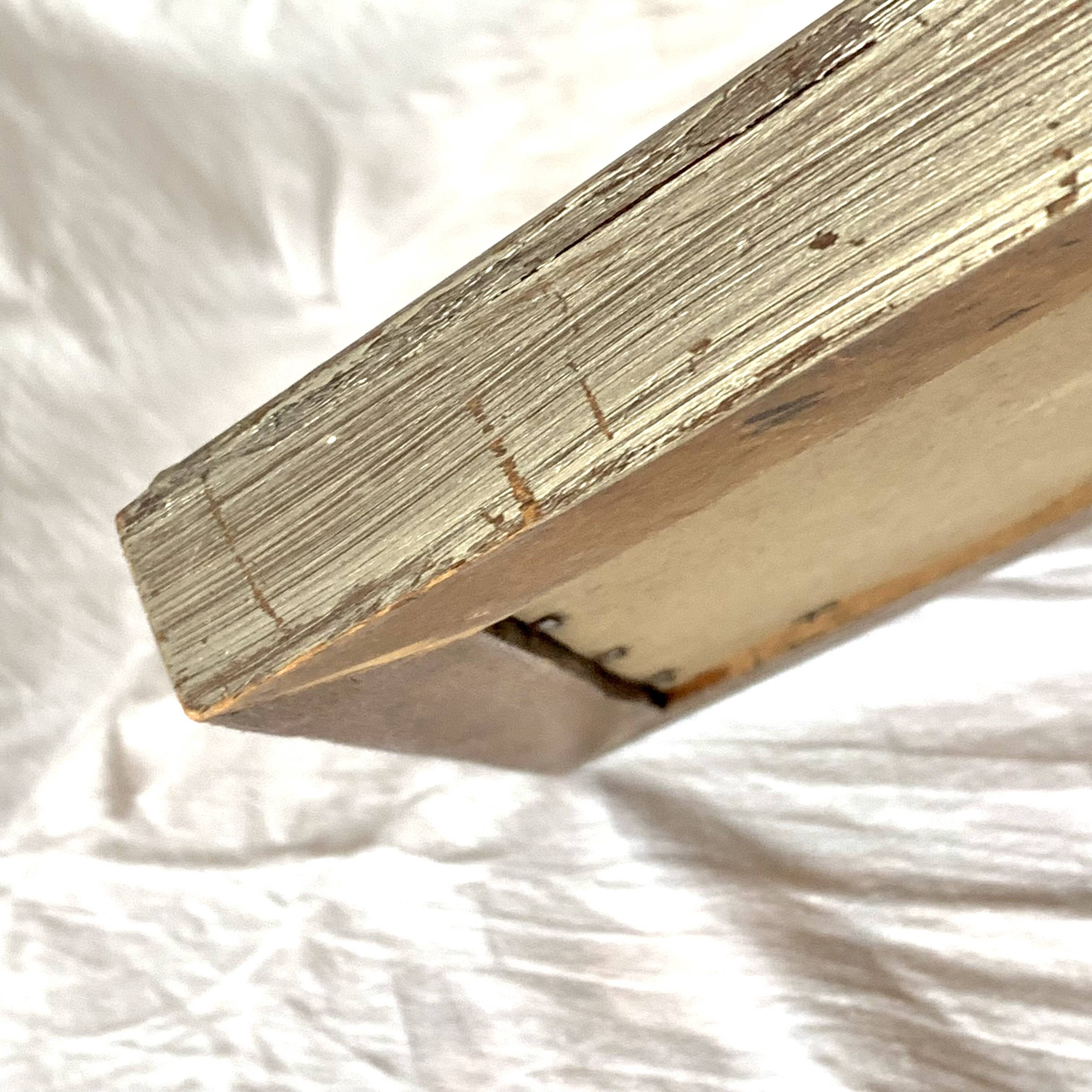 Small vintage wooden diamond wall mirror