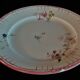 Flat earthenware plate by choisy le roi for au vase étrusque paris