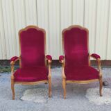 Pair of red velvet voltaire armchairs