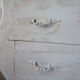Curved patinated chest of drawers pearl grey waxed finish
