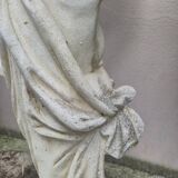 Antique reconstituted stone planter depicting a cherub