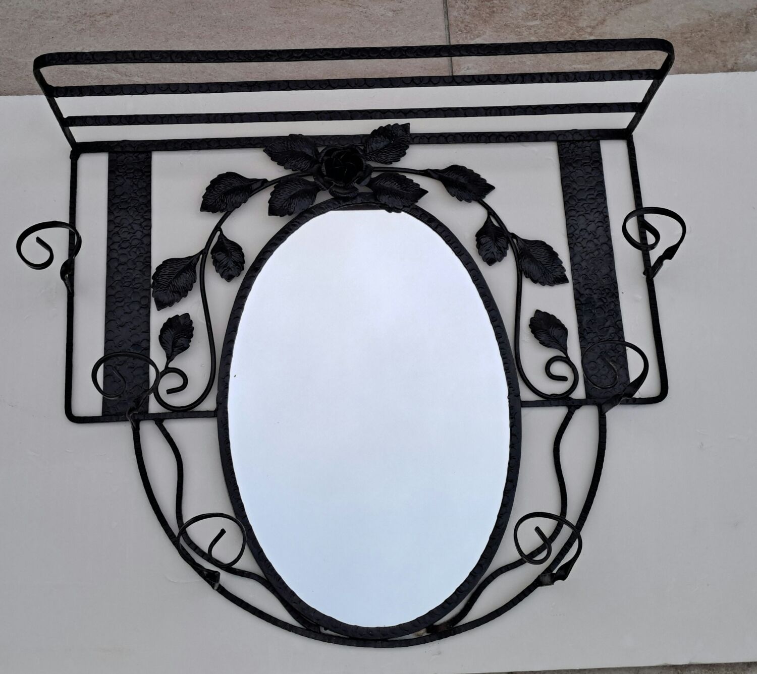 Wrought iron wall coat rack