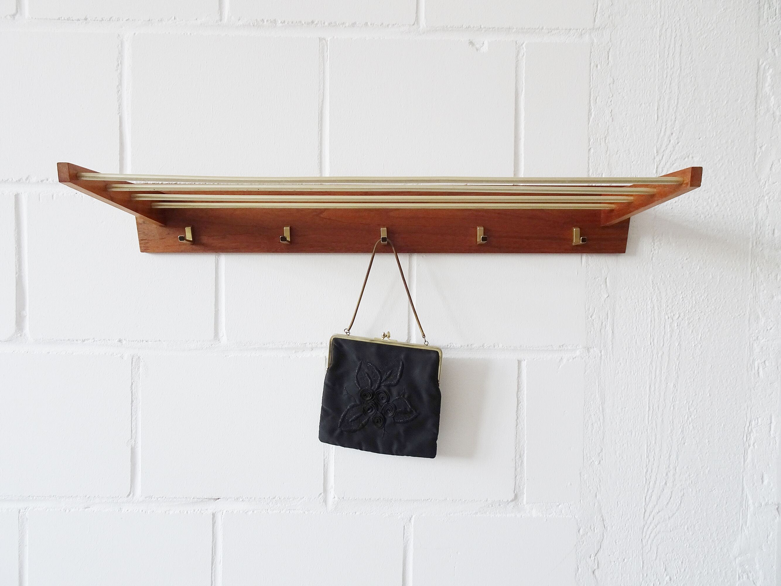 Wall coat rack with hat rack made of teak and gold metal,