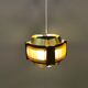 Danish hanging lamp, made in brass colored and brown metal, with yellowish hard pressed plastic deta