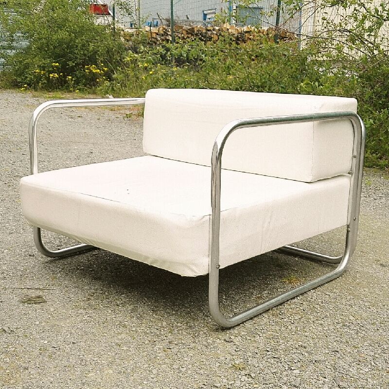 Chrome-designed chair and faux white leather 1970
