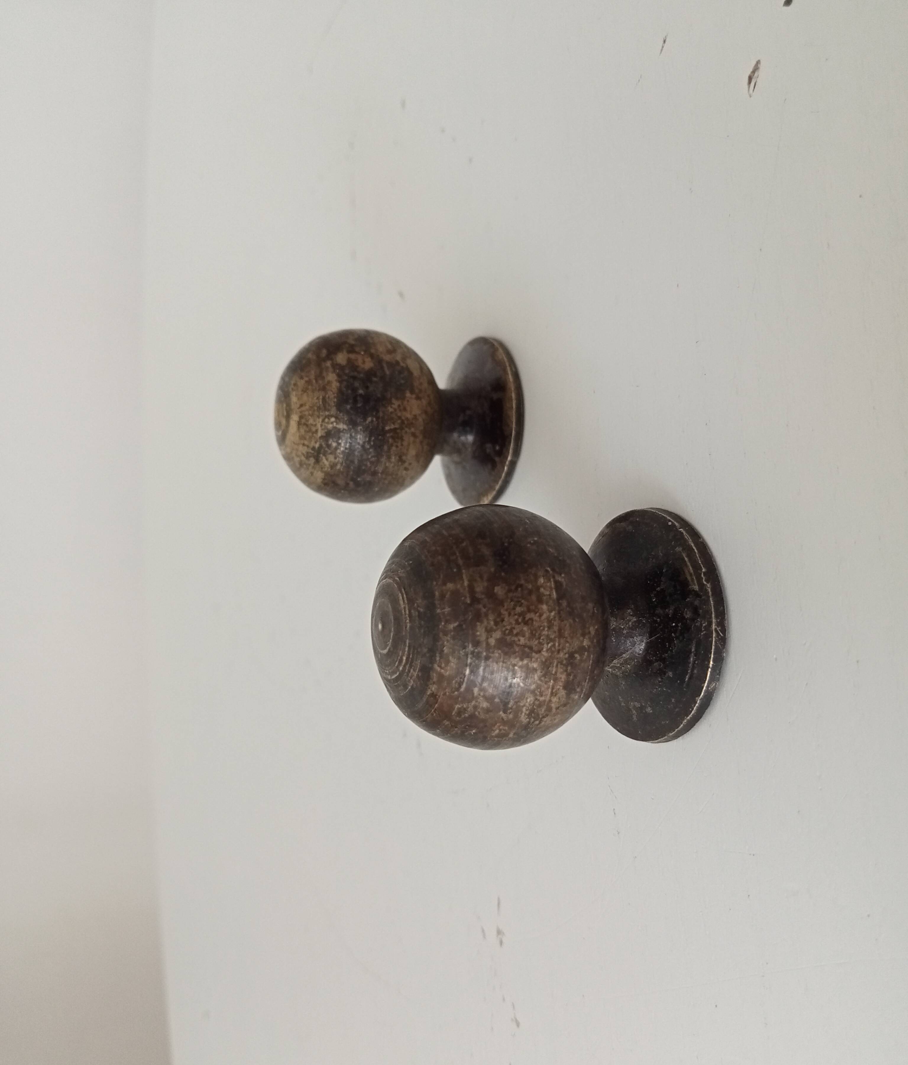 Pair of antique bronze furniture handles.