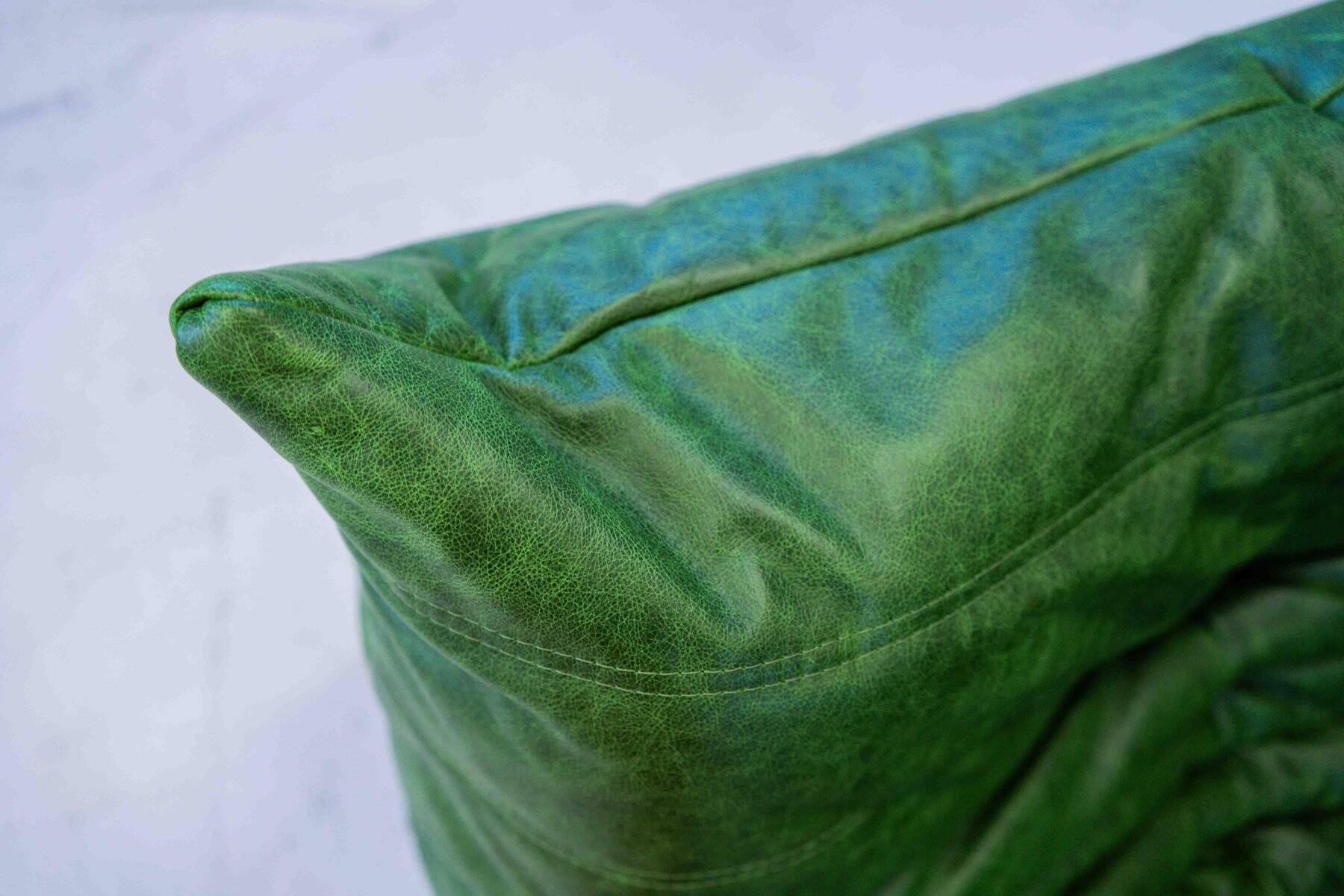 Vintage two-seat Togo sofa with arms in green leather by Michel Ducaroy for Ligne Roset, 1970s