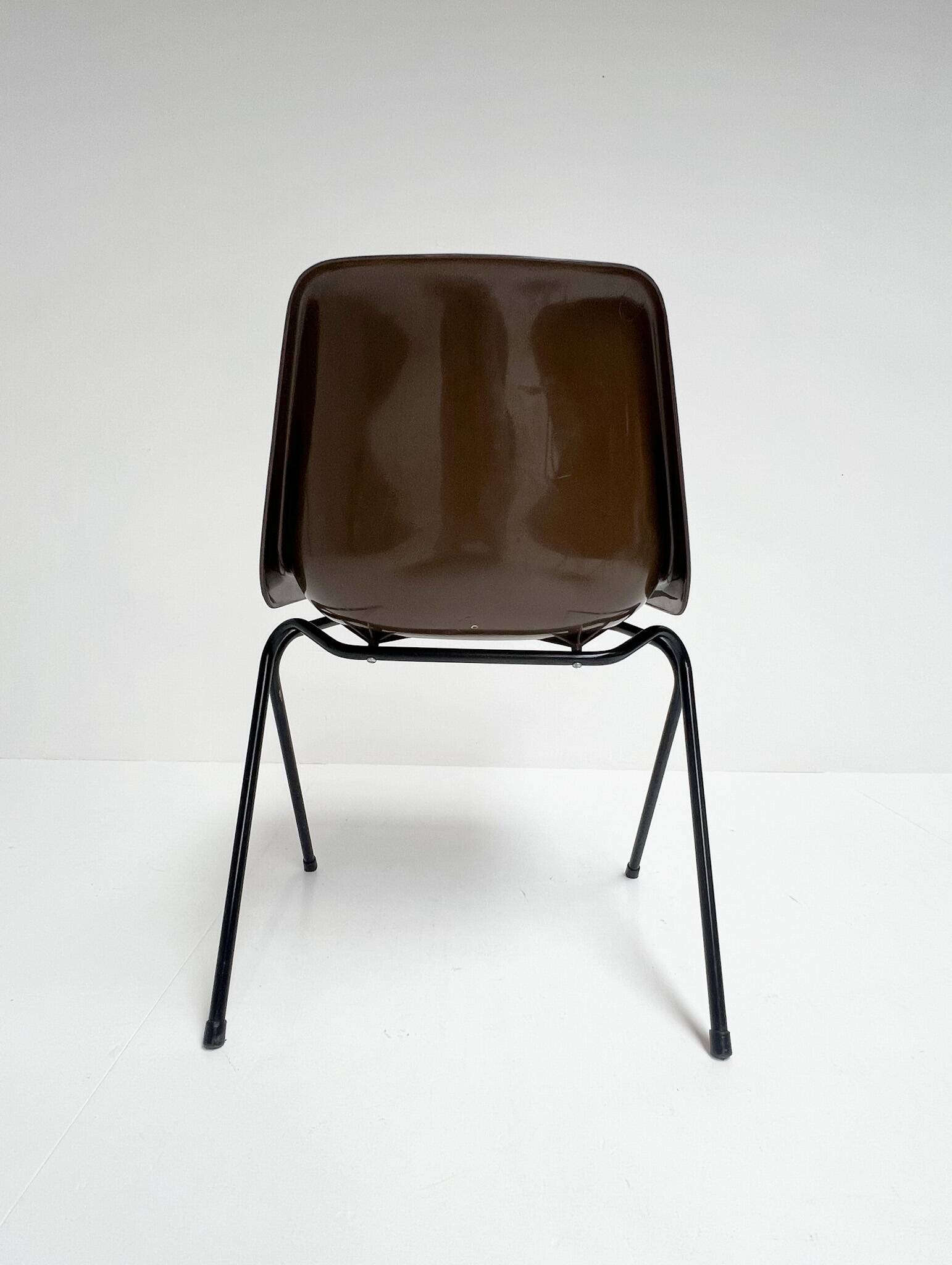 Brown and black set of 6 Polyprop chairs on a metal frame. The Polyprop cha