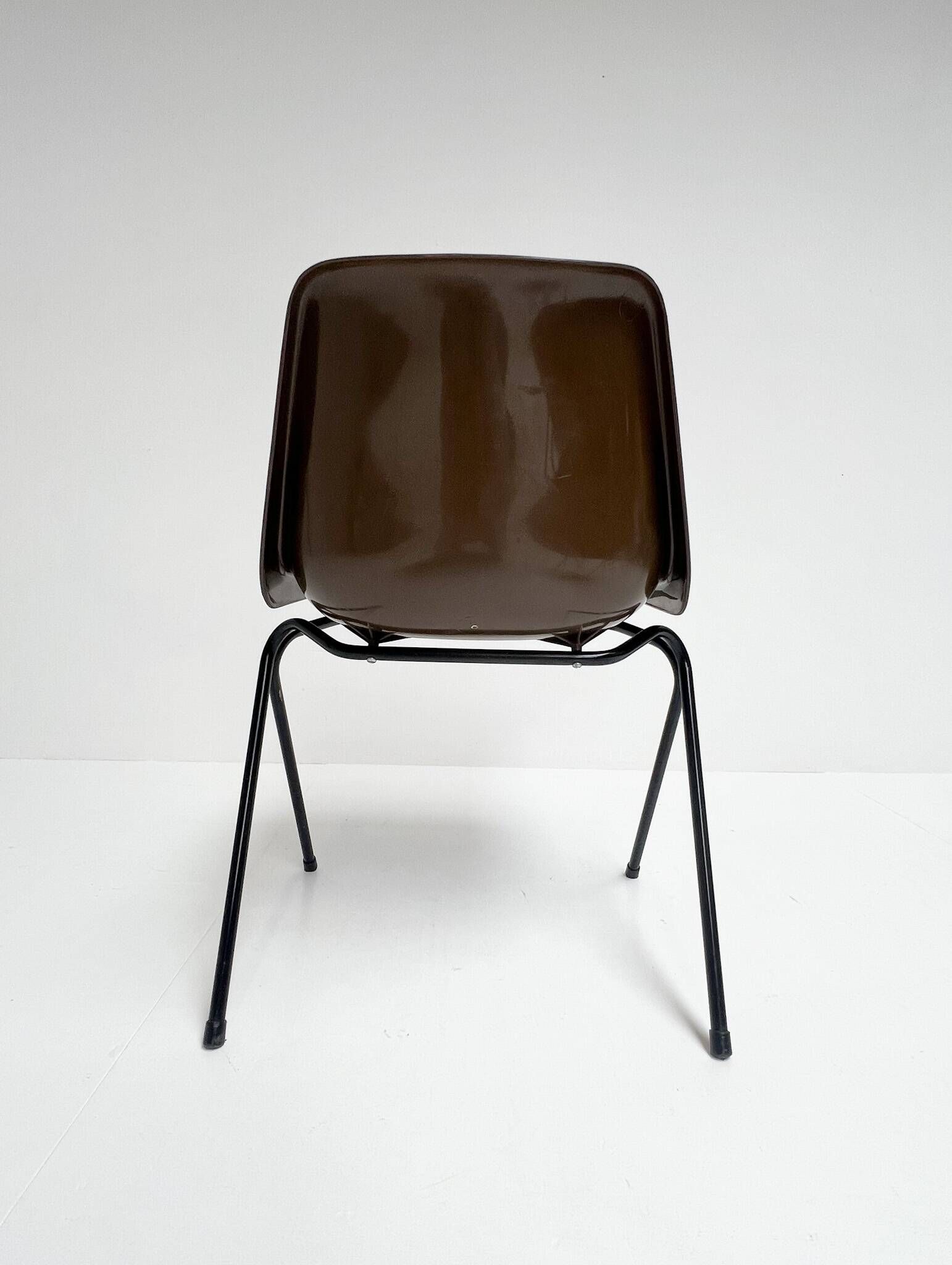 Brown and black set of 6 Polyprop chairs on a metal frame. The Polyprop cha