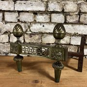 Pair of bronze andirons stamped bouhon frères in louis xvi style