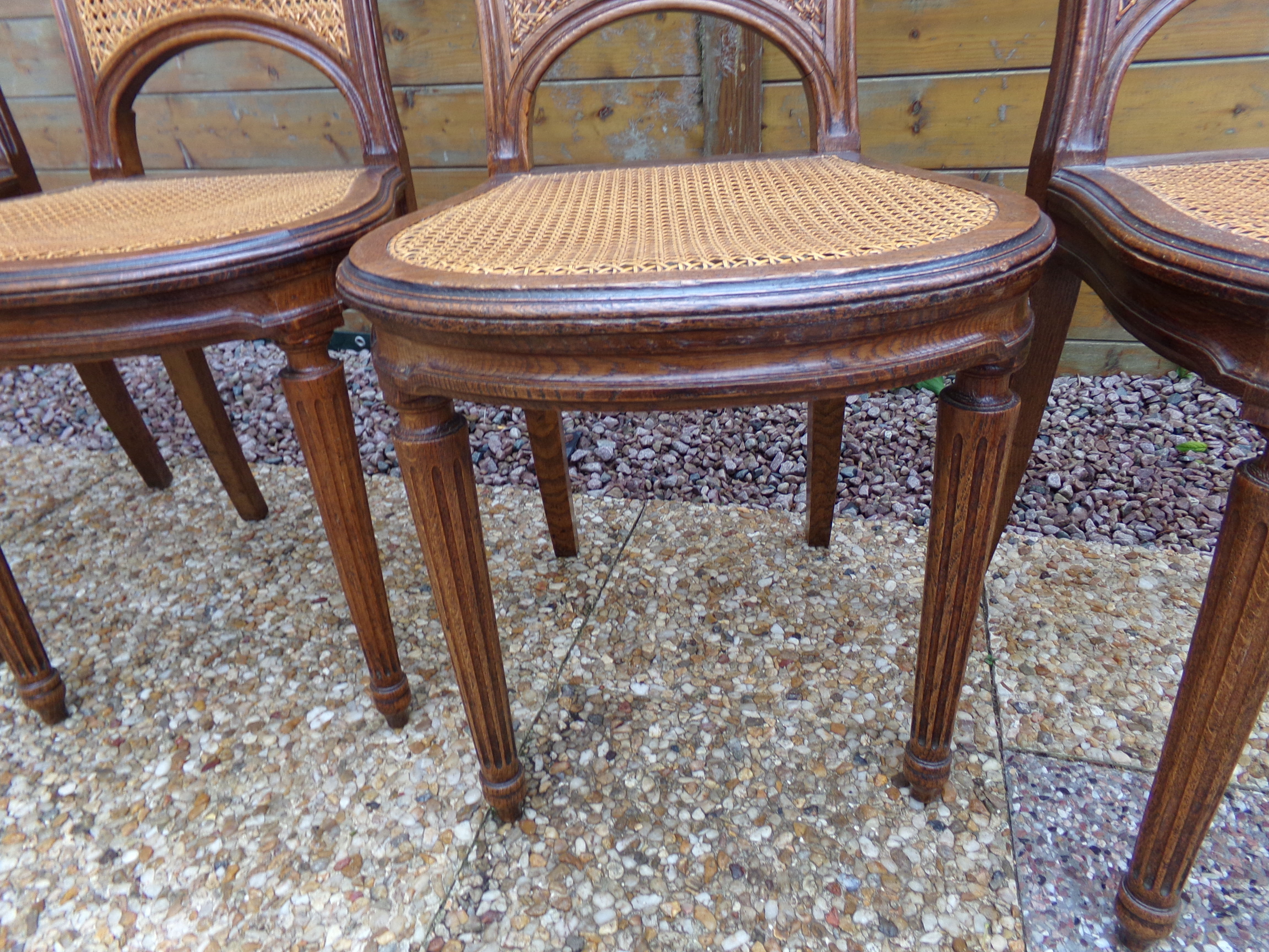 Set of 8 Louis XVI style convertible chairs, canned, racket backrest