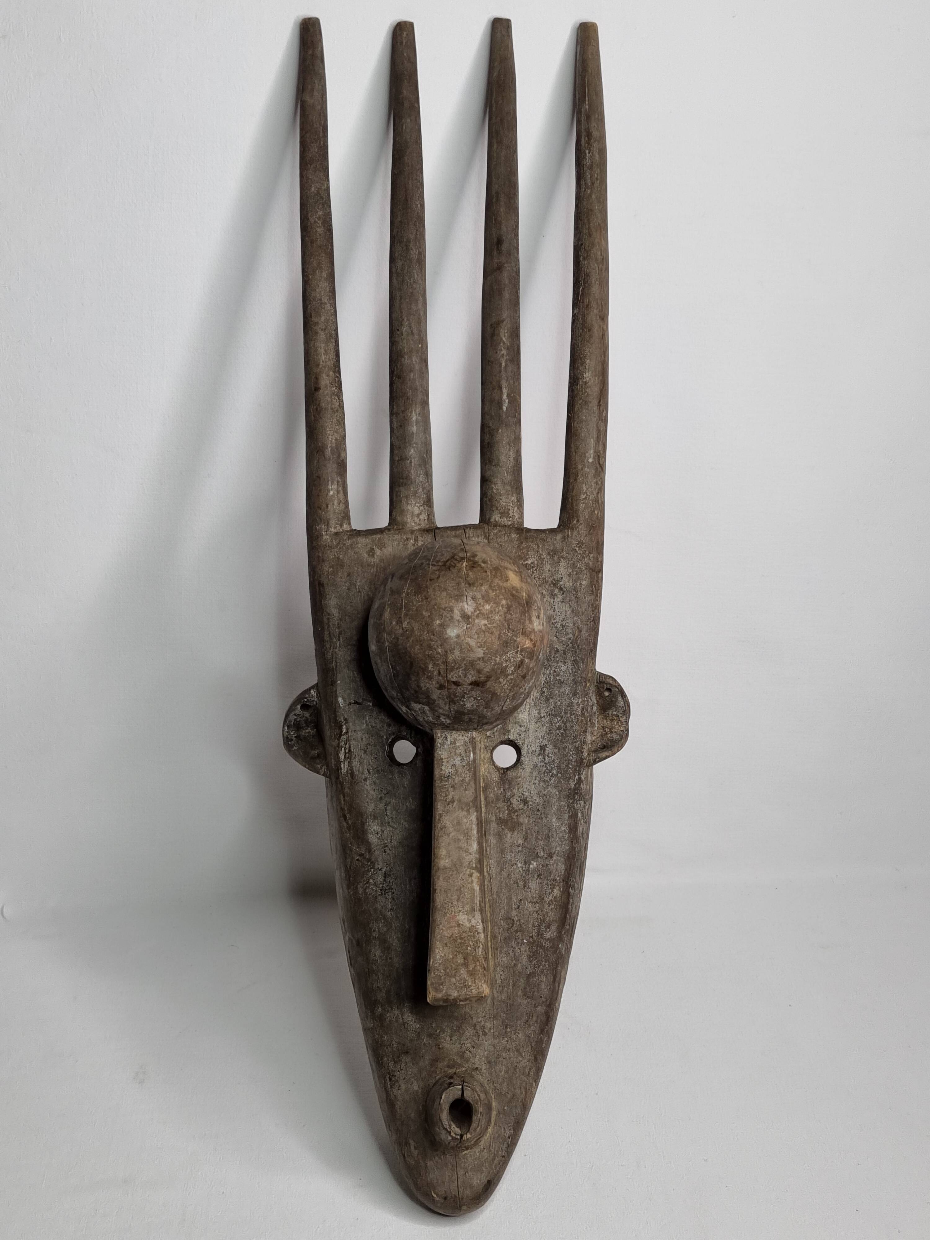 N'Tomo Bambara Mask, Mali, Carved Wood, Antique Patina, 20th Century, 64 cm