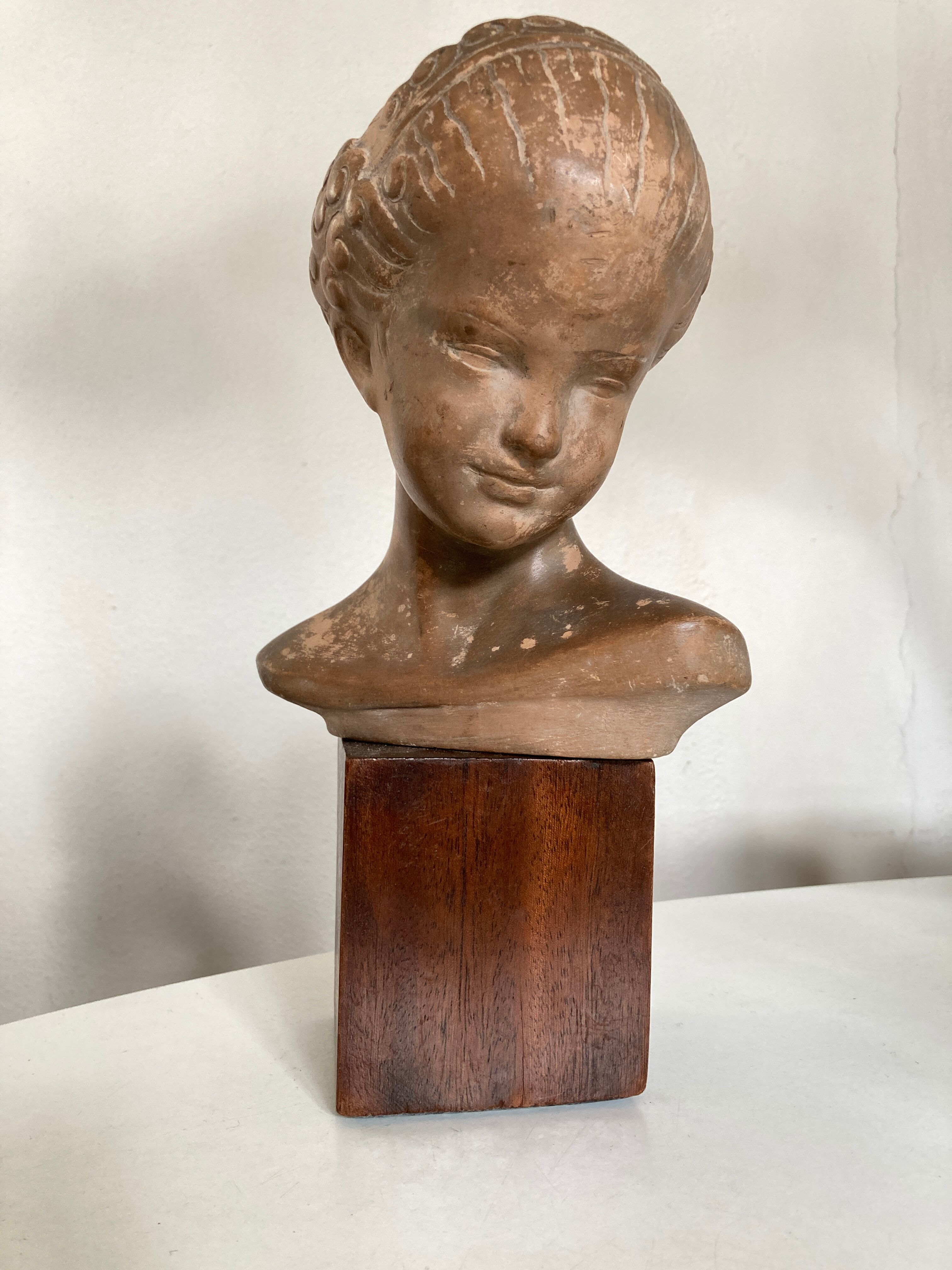 Child's head in terracotta 1920 wooden base