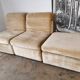 Pair of modular velvet armchairs and ottoman