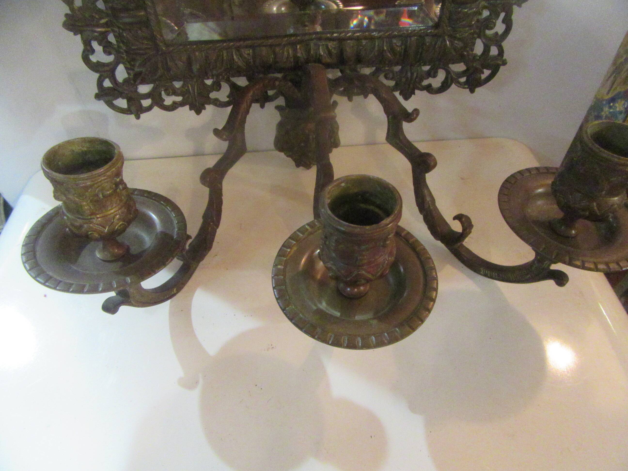 Bronze candle holder mirror