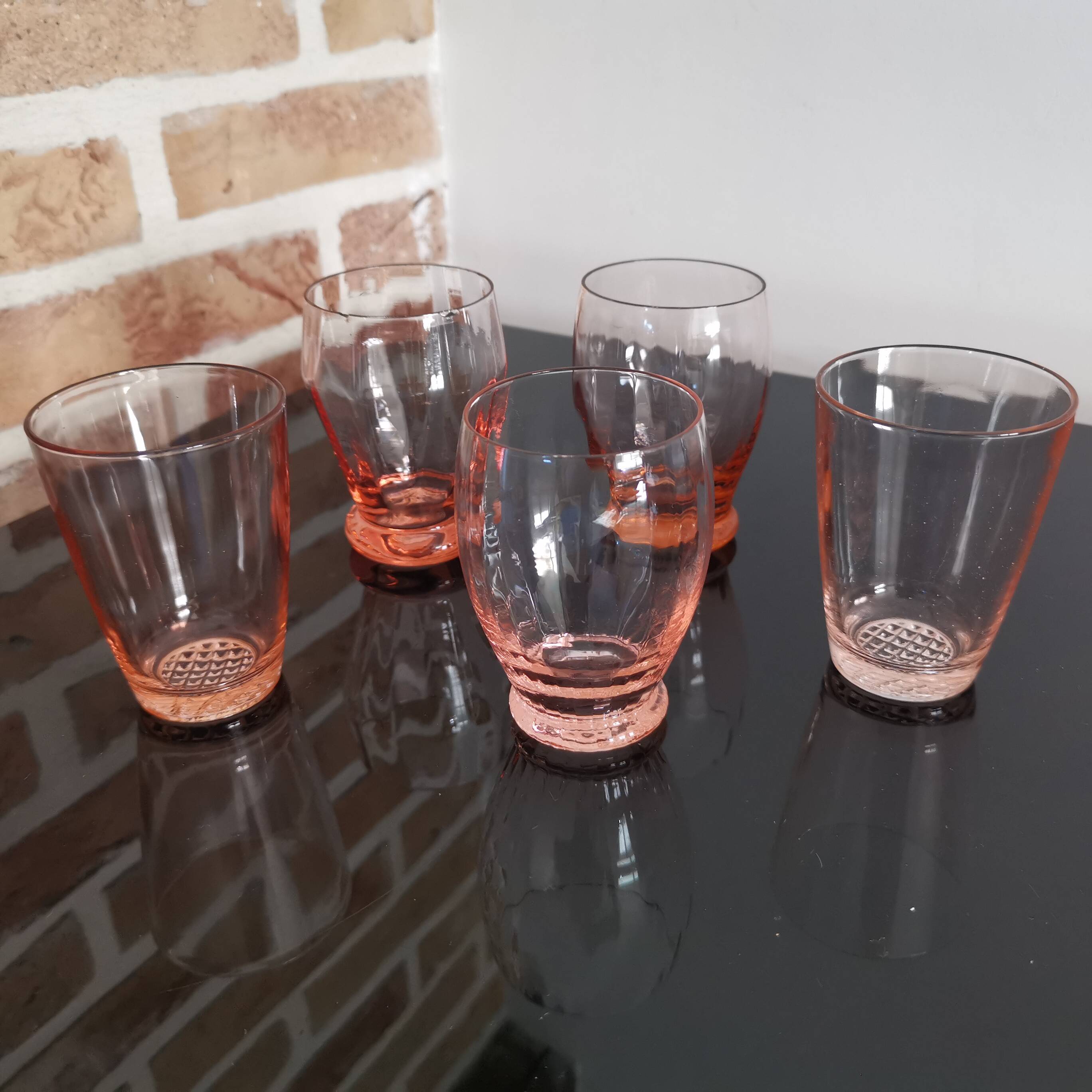 5 mismatched vintage pink glasses
