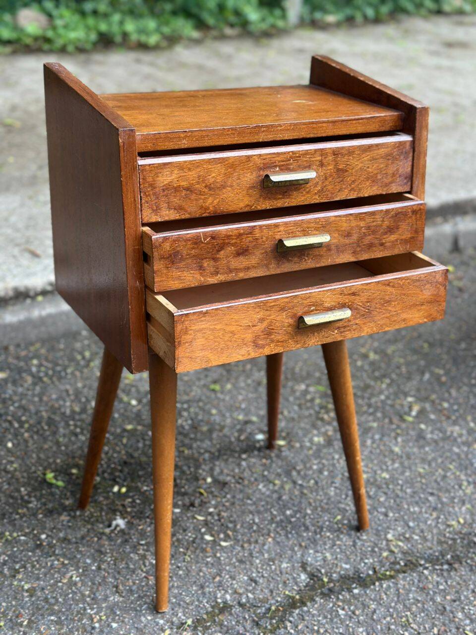 Scandinavian bedside table in oak from the 1960s with tapered legs and 3 drawers.