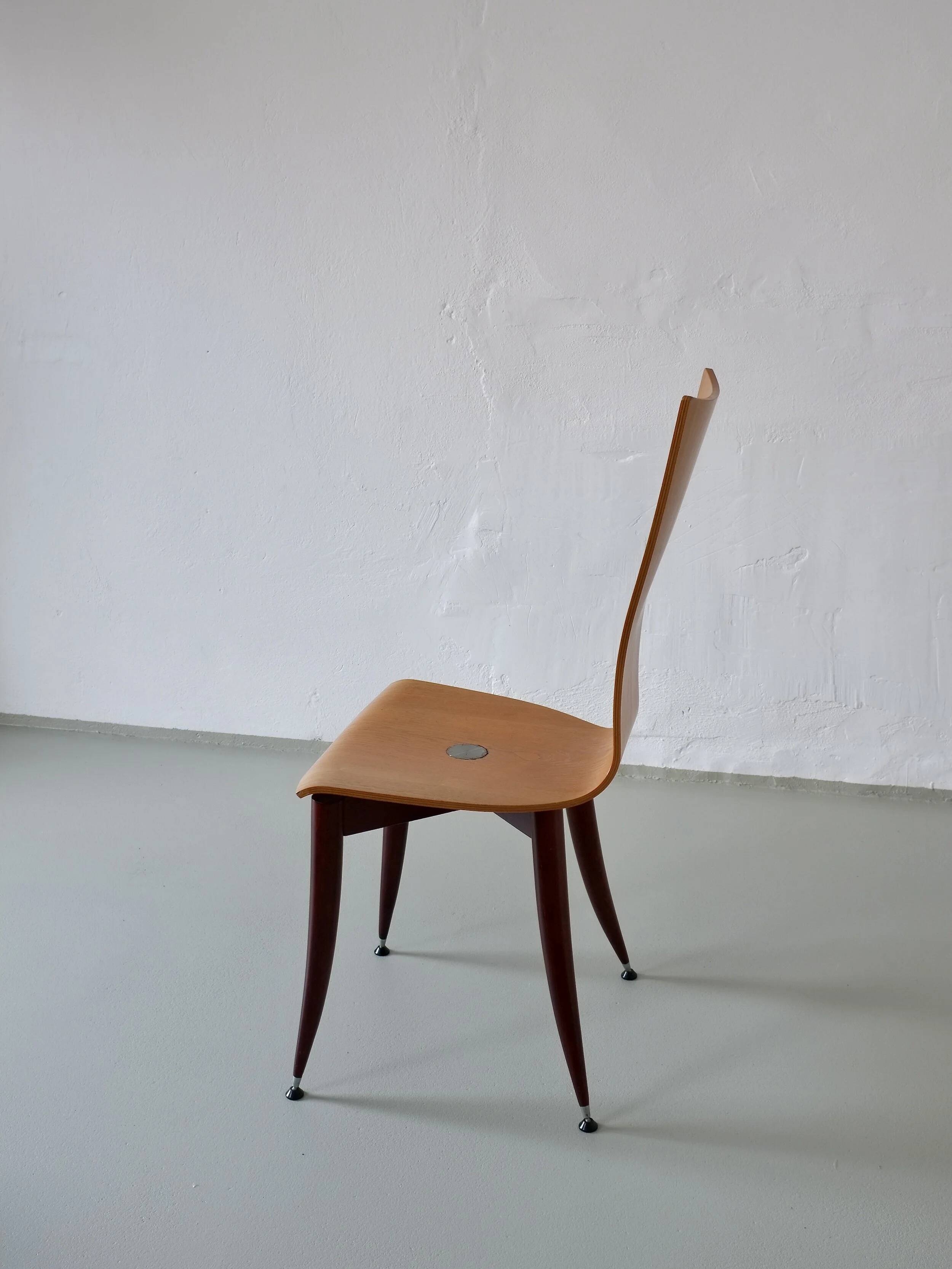 3 plywood chairs with burgundy legs | Italy | 1980s