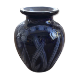 Artisan vase with floral motifs