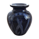 Artisan vase with floral motifs