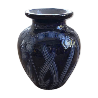 Artisan vase with floral motifs