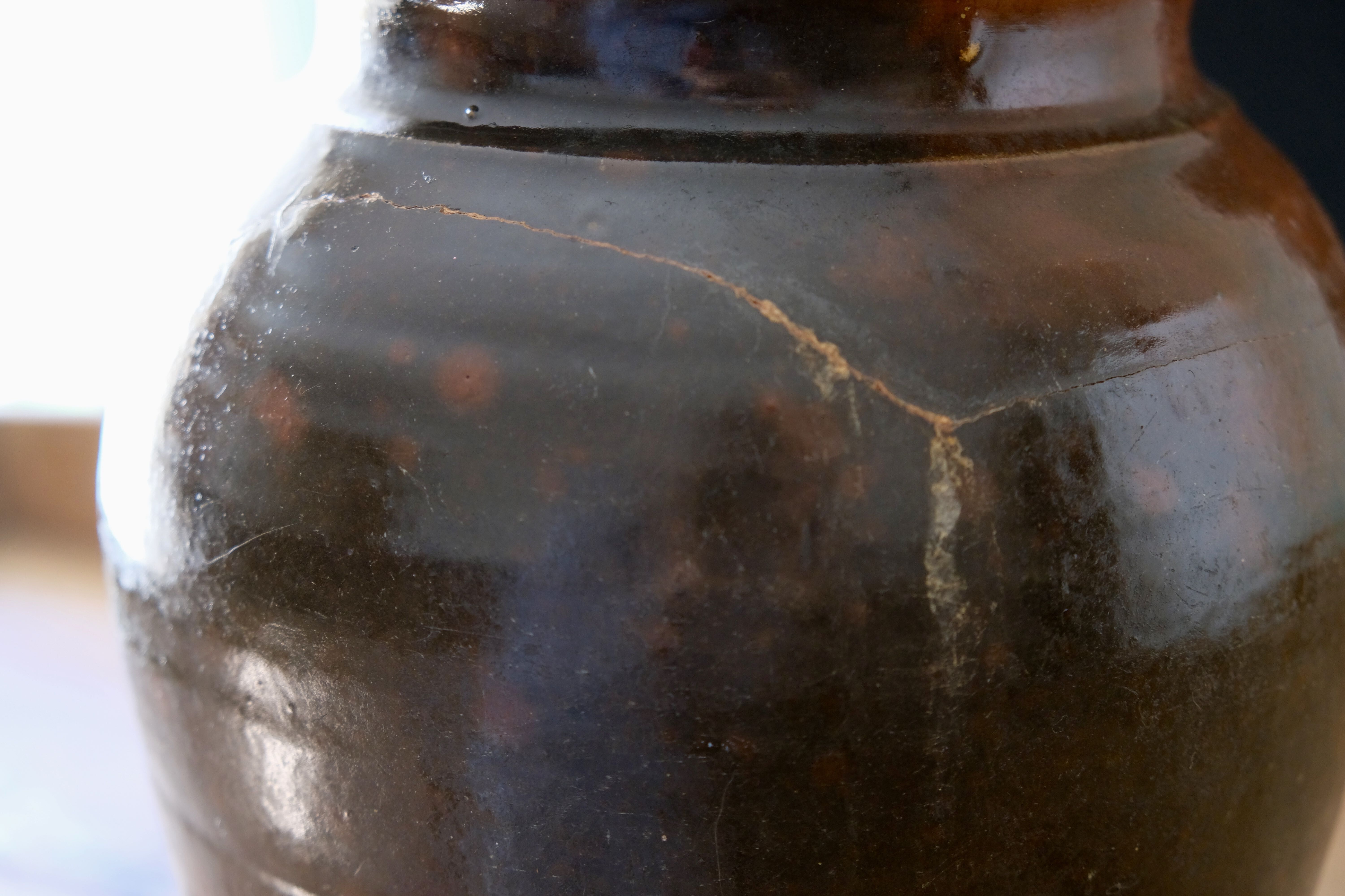 Old glazed terracotta pot