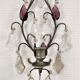 Metal wall candle holder with glass tassels