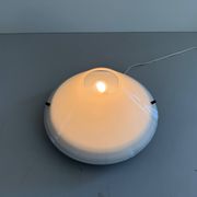 Simple opal glass wall light from the mid-century by Lamperti, 1960s, Italy.