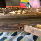 Golden trumeau mirror for fireplace, late 19th century, with sculpted pediment.