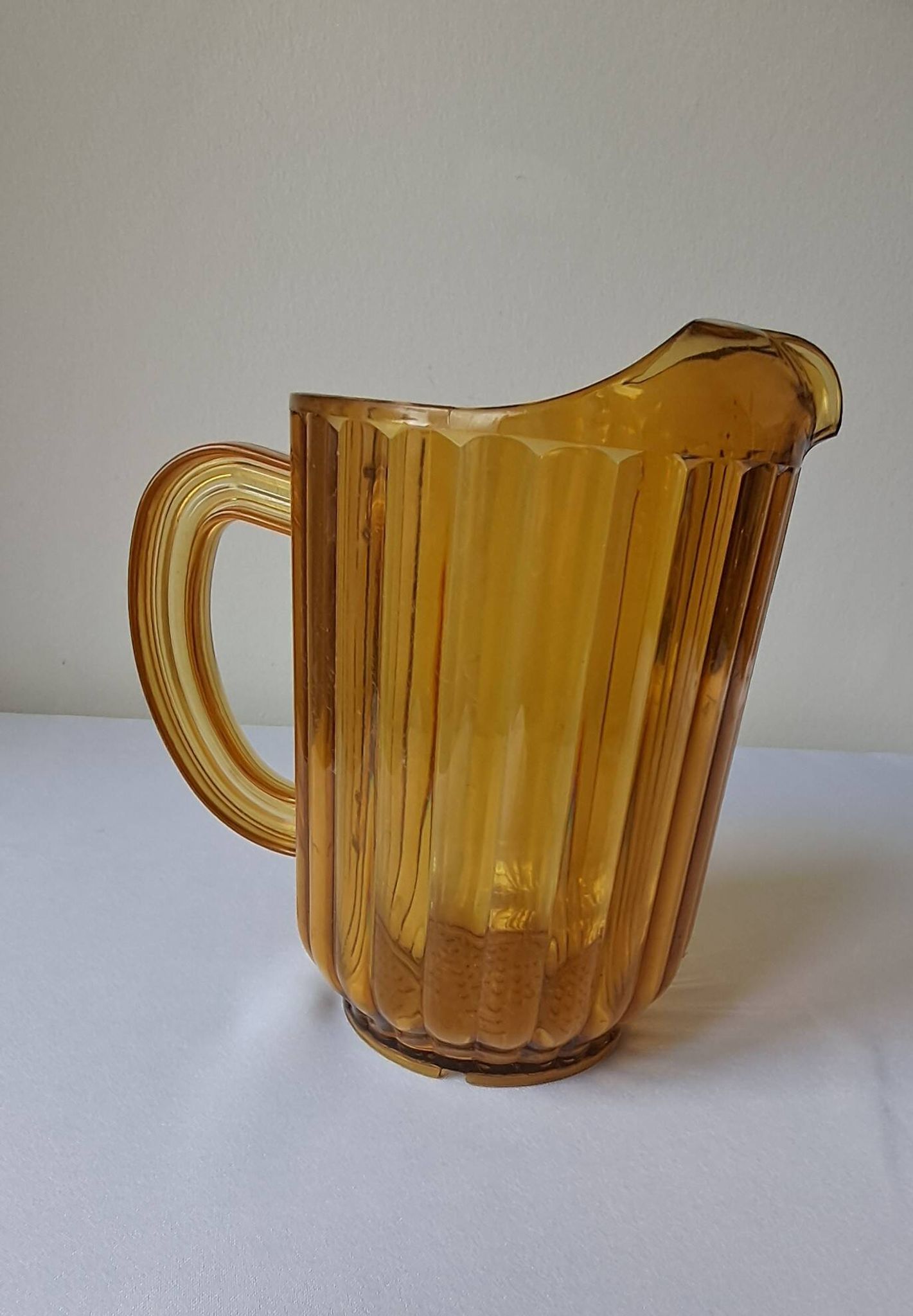 Vintage amber polycarbonate jug