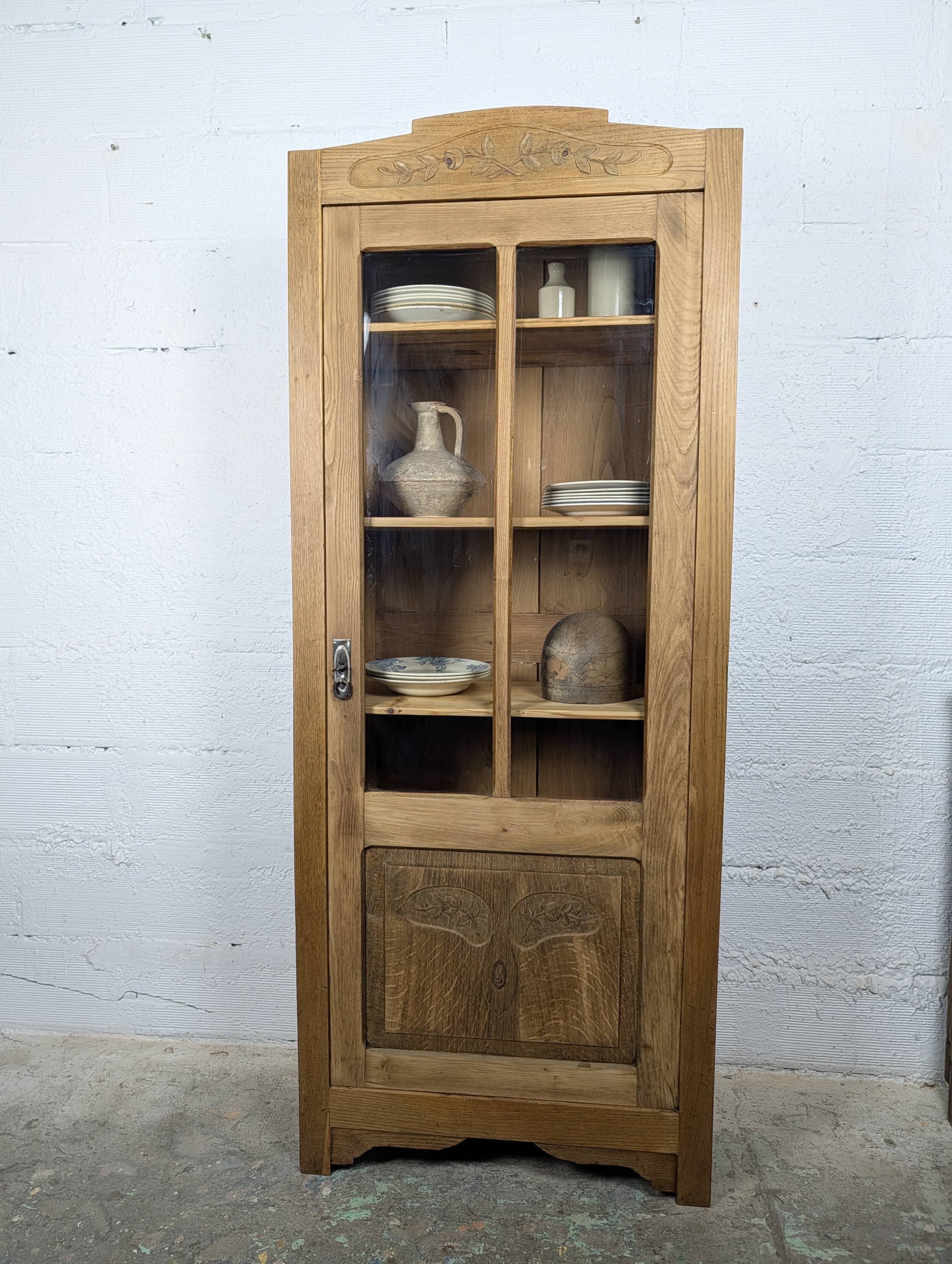 Glass-fronted cabinet from the 1930s-1940s.