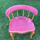 Pink gondola armchair with fringe