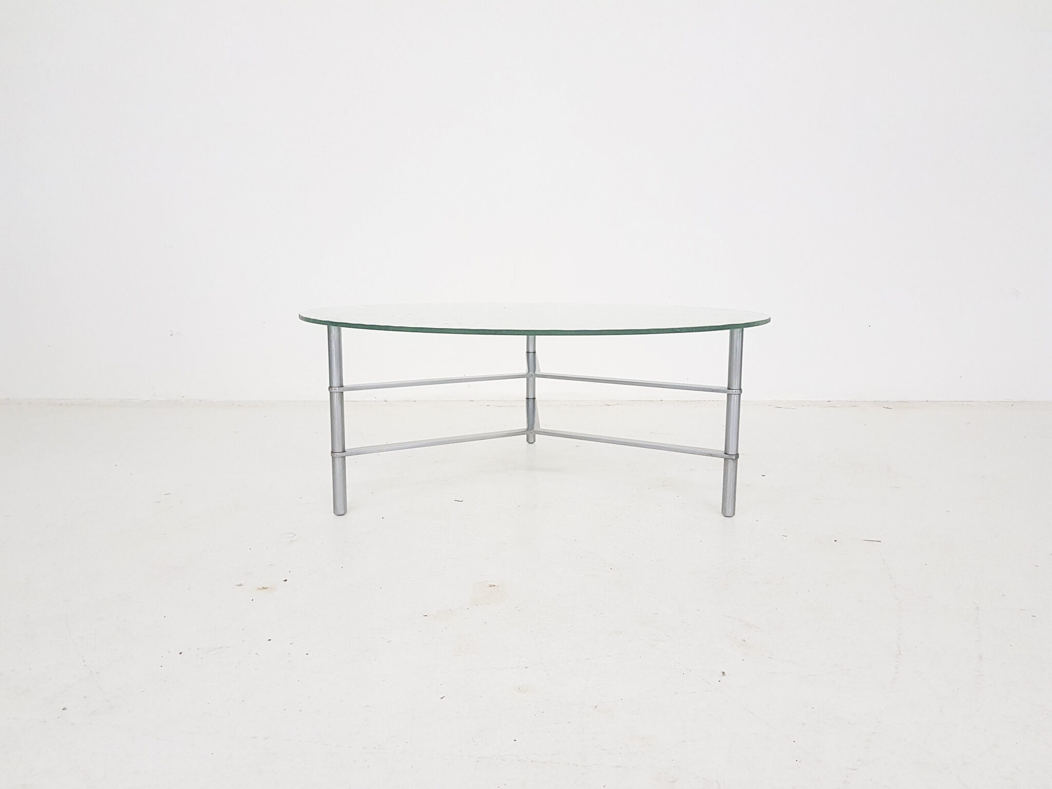 Mid-century round glass and chrome coffee table