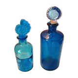 Set of two blue glass bottles