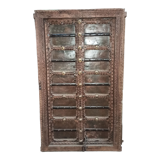 Old wooden door with frame