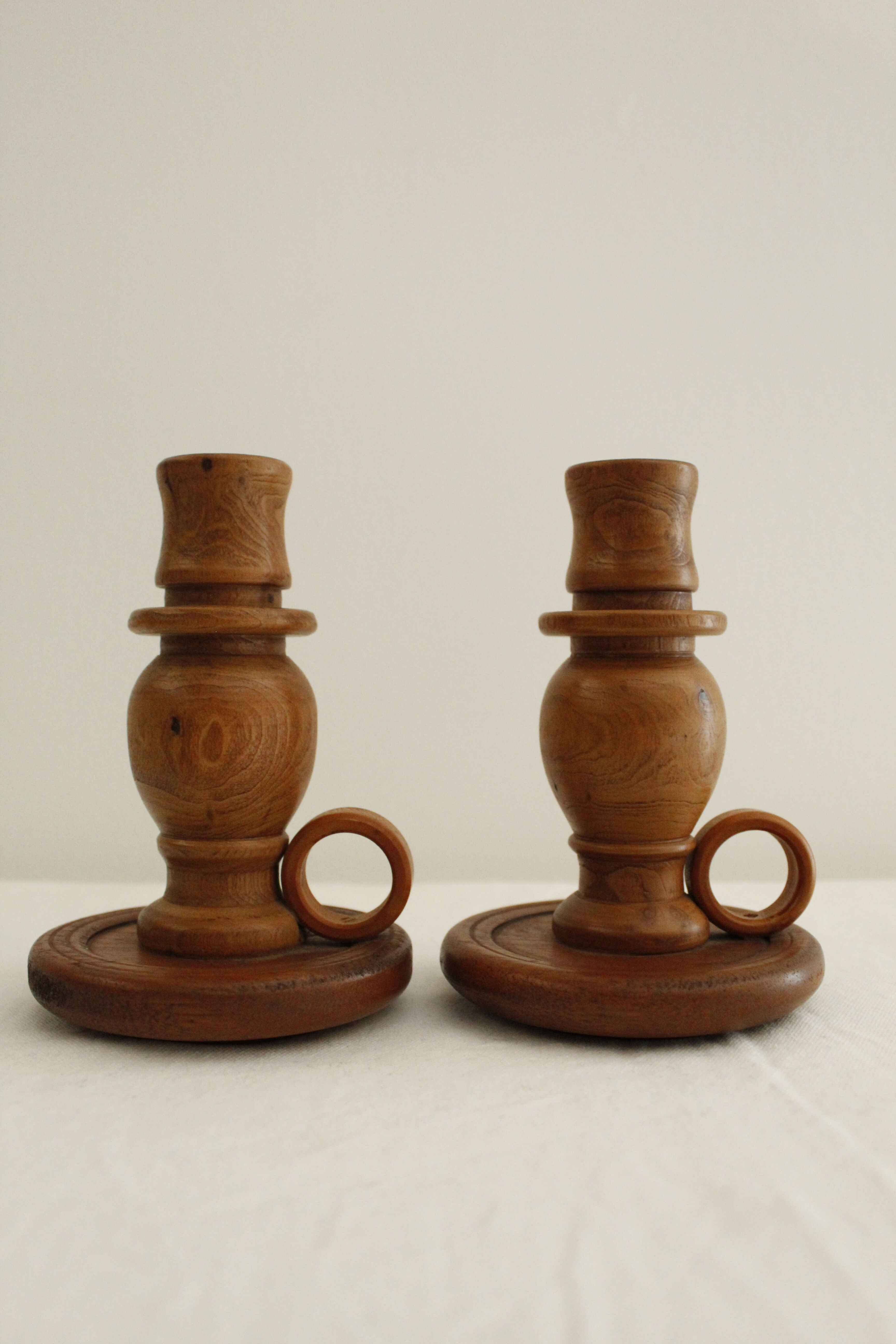 2 wooden candle holders