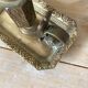 Antique brass thumb candle holder