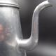 Ancienne cafetière en aluminium - anse rouge - vers 1930