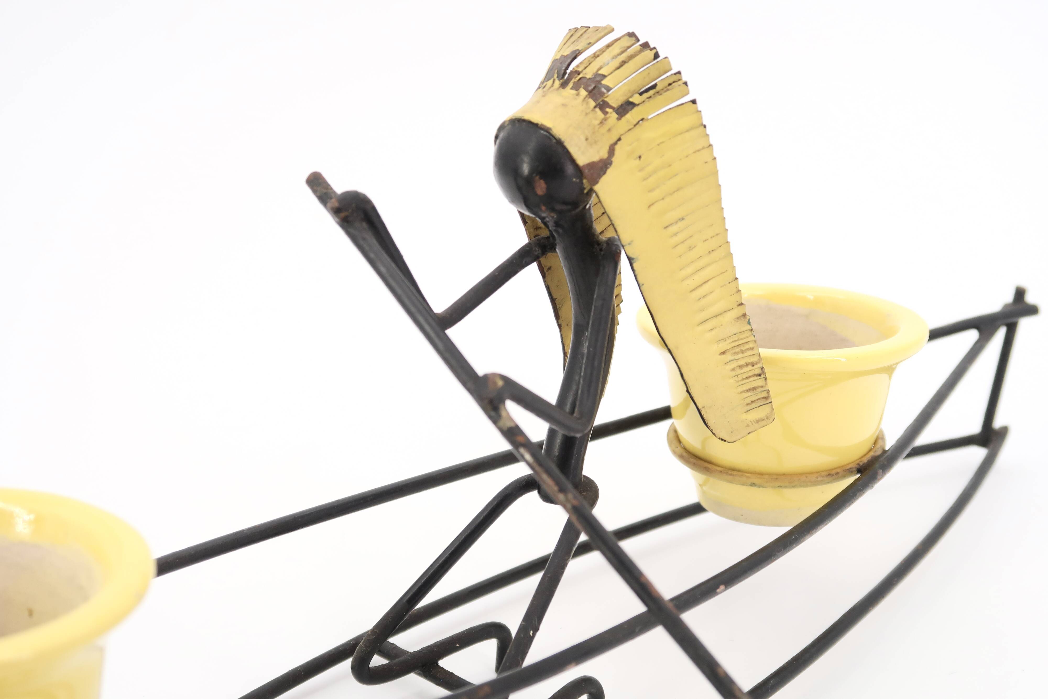 Ceramic flower pot in dugout with Indian, 1950s