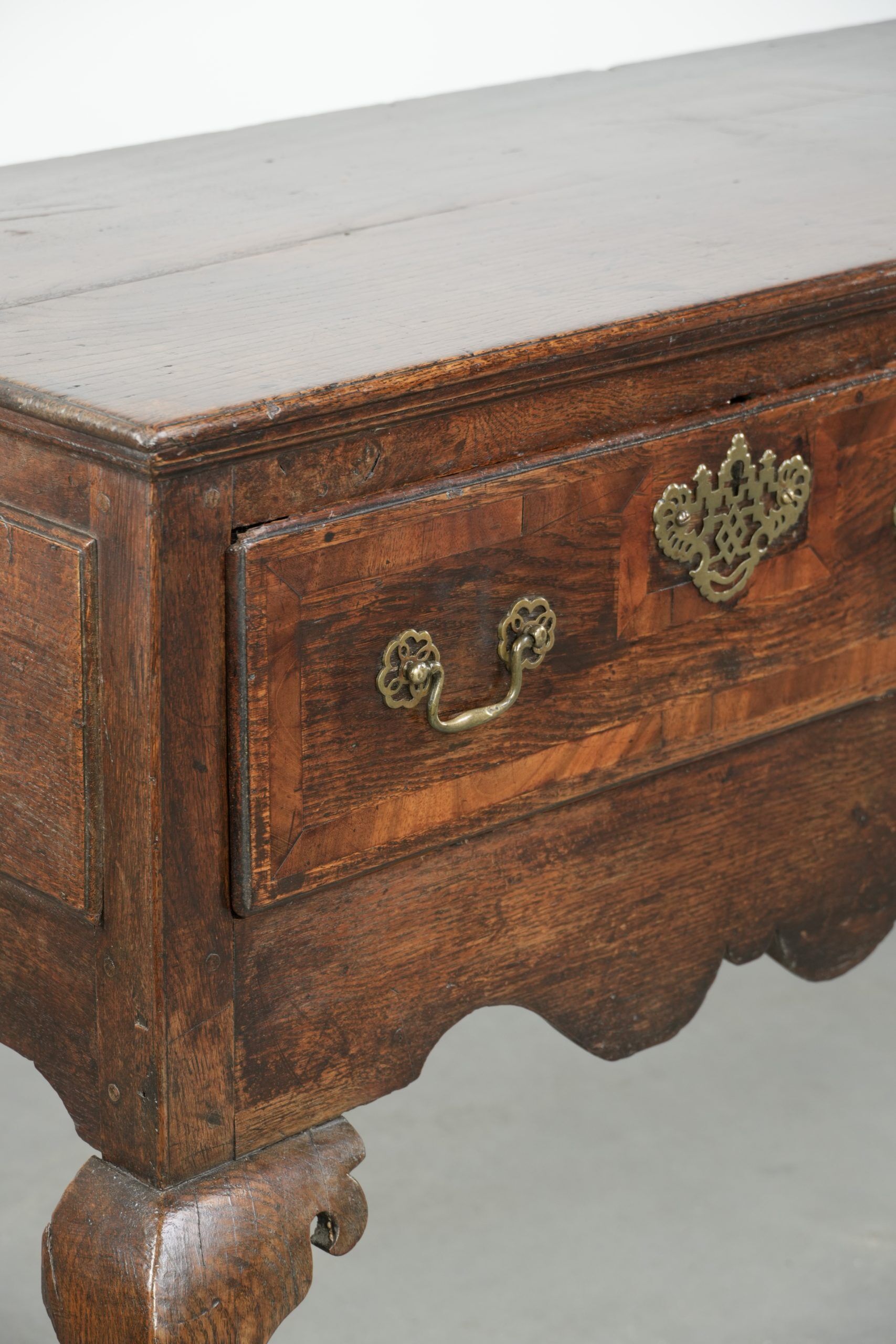 Large antique English oak sideboard from the 18th century with elegant legs