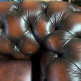 Brown tufted English Chesterfield leather sofa