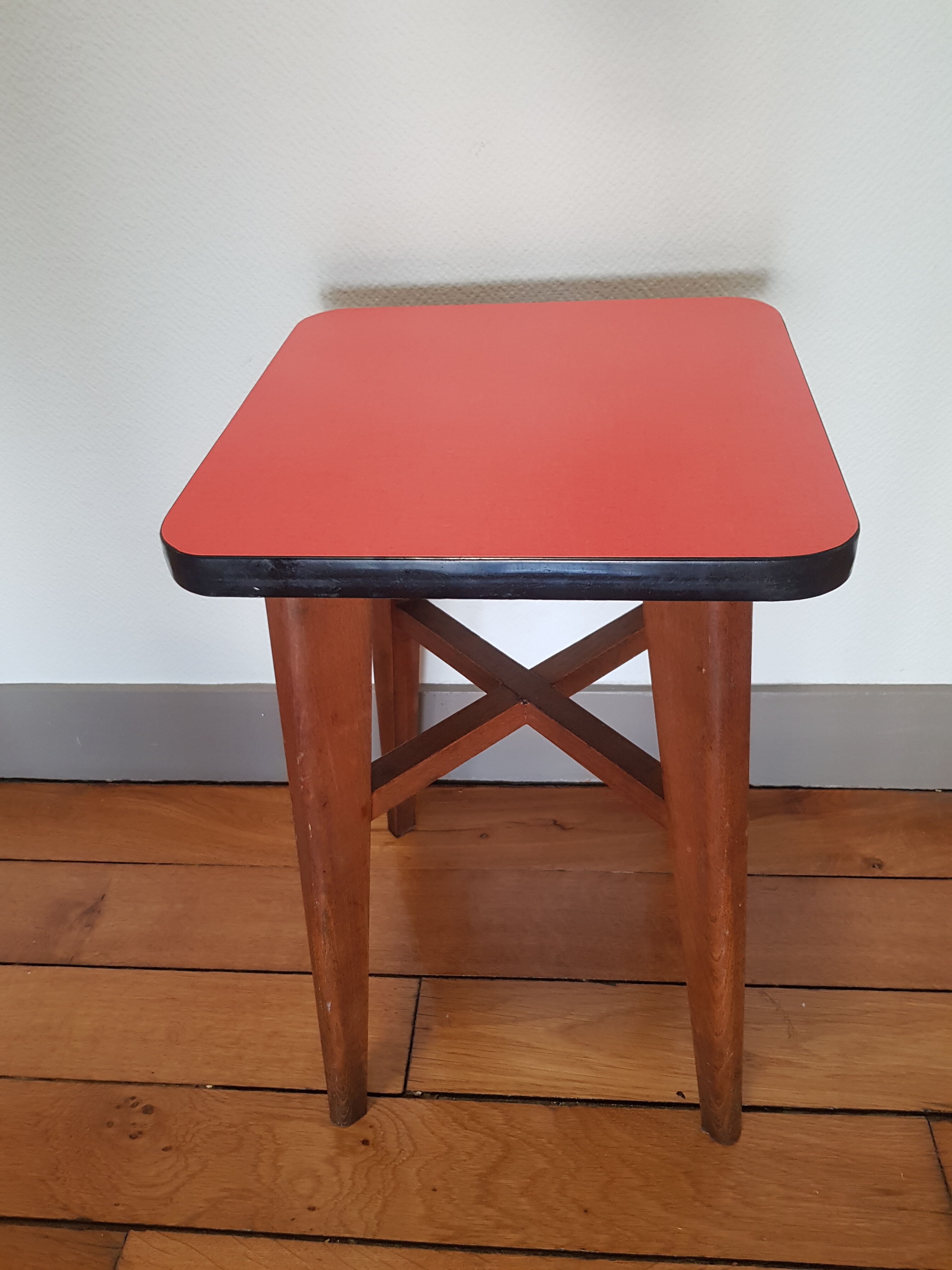 Wooden and red formica stool