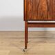 Mid-century rosewood bar with roller doors, Denmark, 1960s
