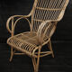 Vintage high back rattan armchair