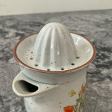 Vintage stoneware jug and its citrus juicer.