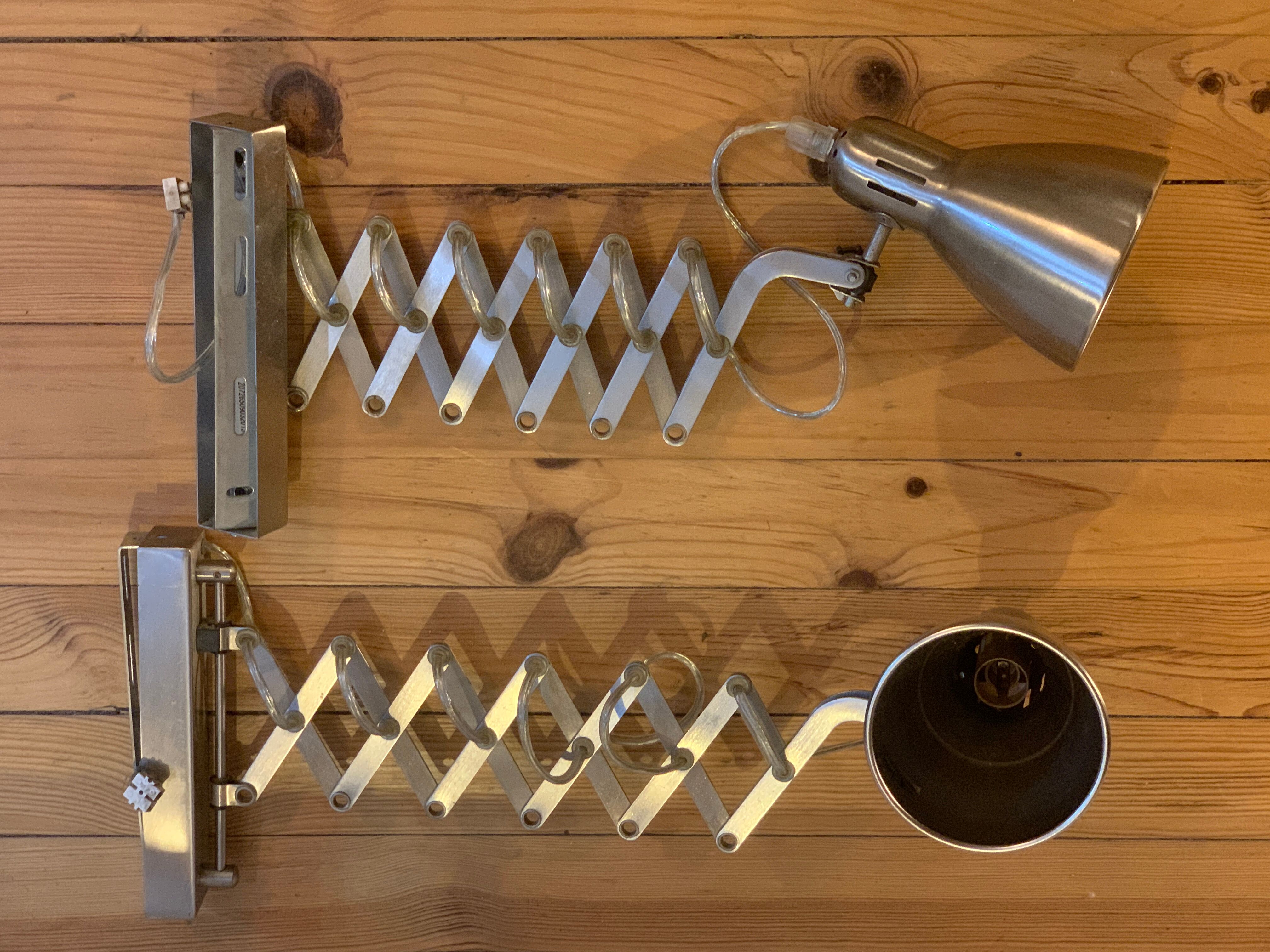 Industrial style retractable wall sconces